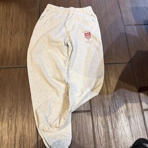 Sporty & Rich Heather Gray Joggers with Crimson Emblem